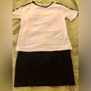 Puma shirt size xs with size s skirt